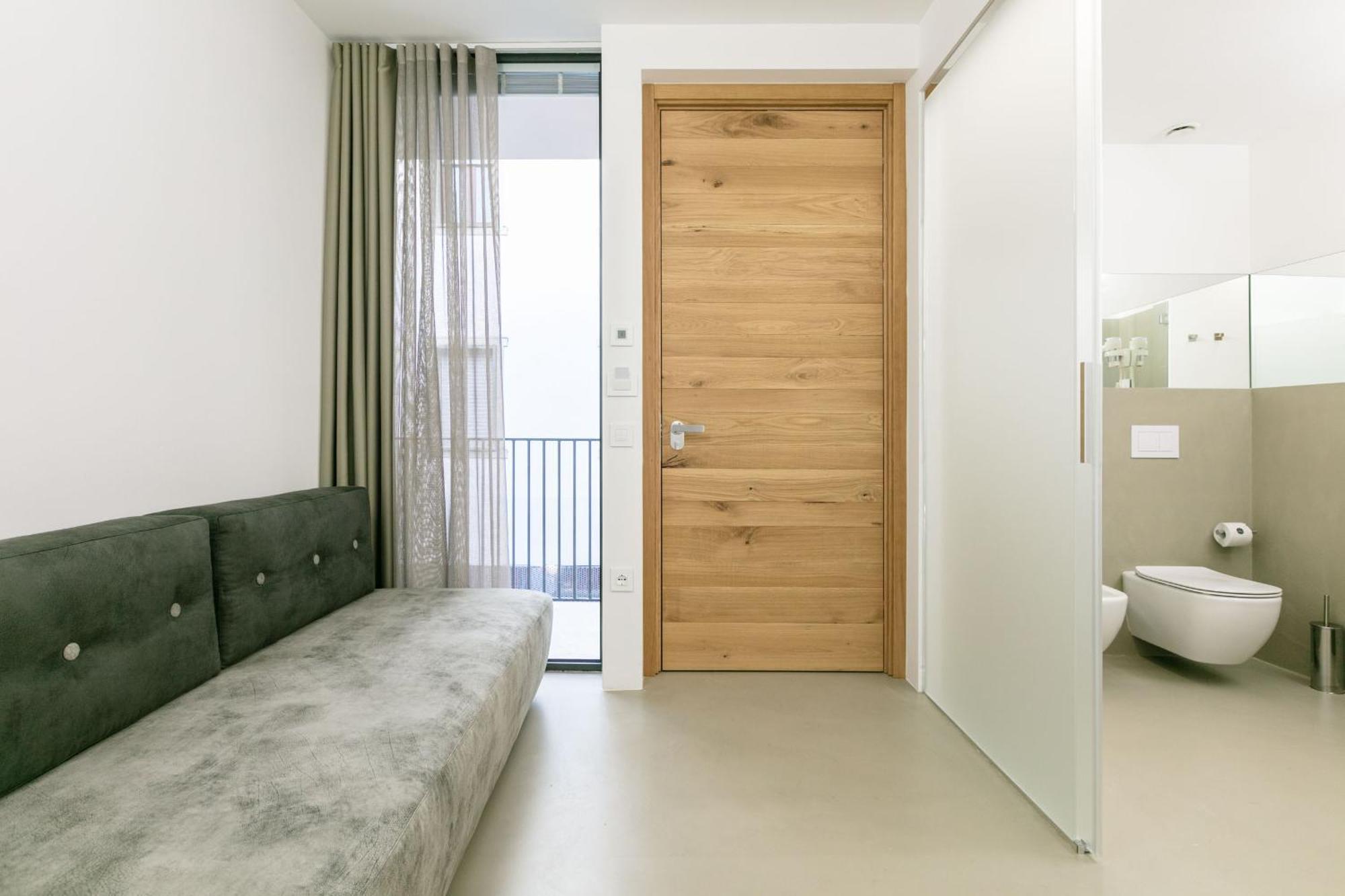 Domus Cavour Rooms&Suites Tirano Pokoj fotografie