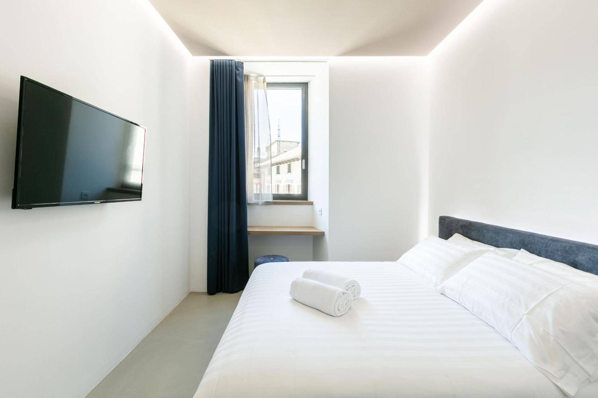 Domus Cavour Rooms&Suites Tirano Pokoj fotografie
