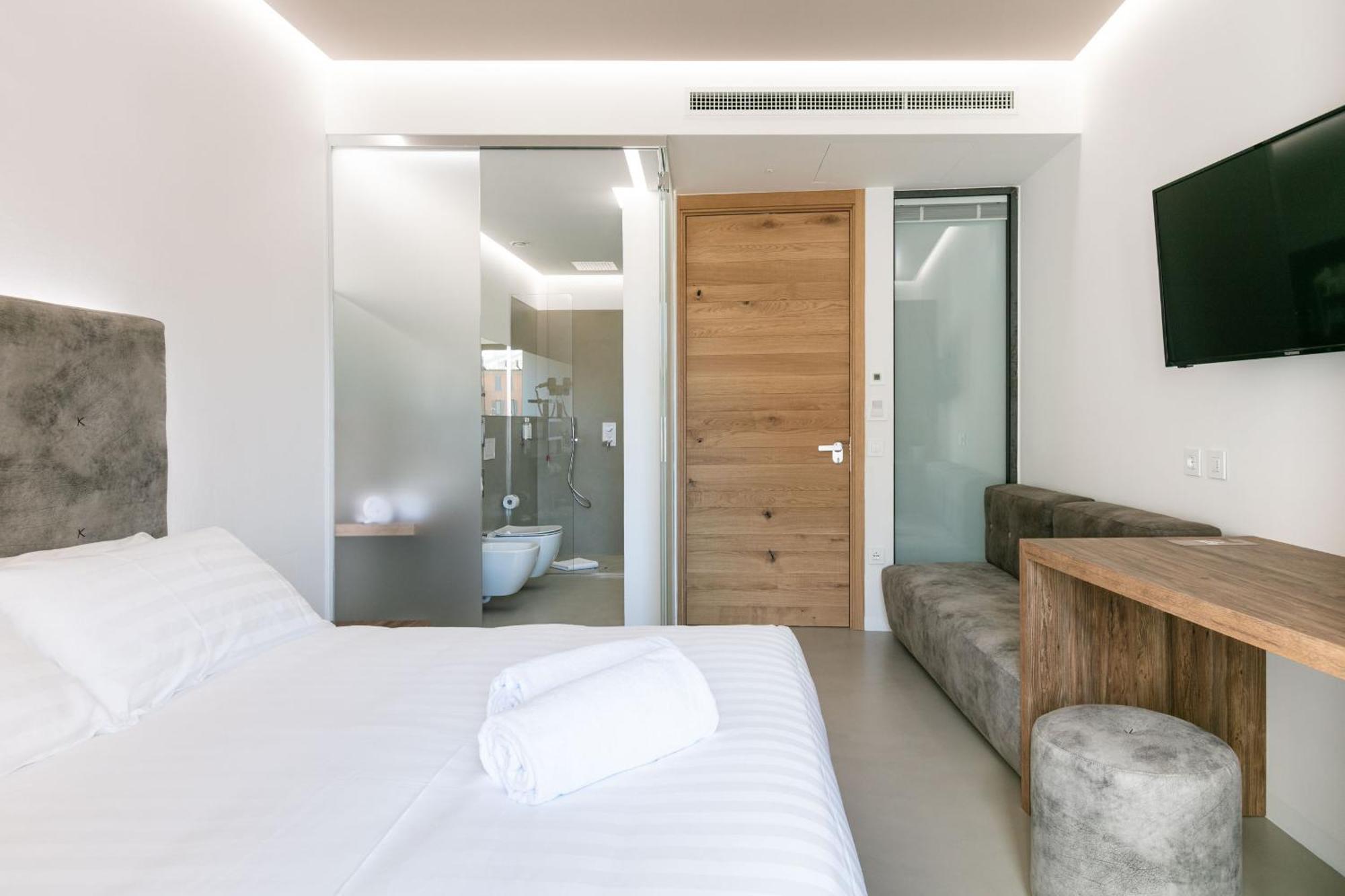 Domus Cavour Rooms&Suites Tirano Pokoj fotografie