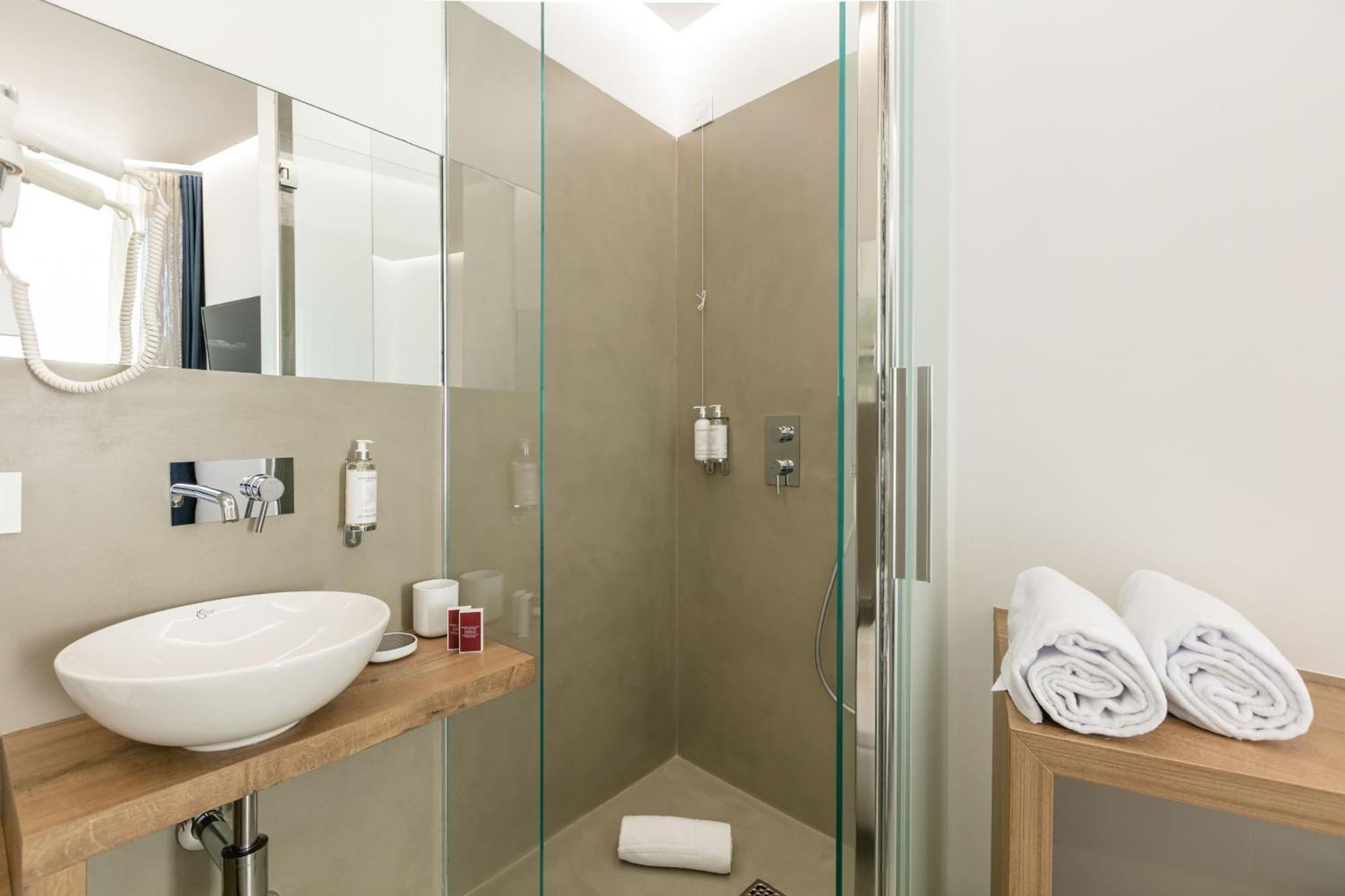 Domus Cavour Rooms&Suites Tirano Pokoj fotografie