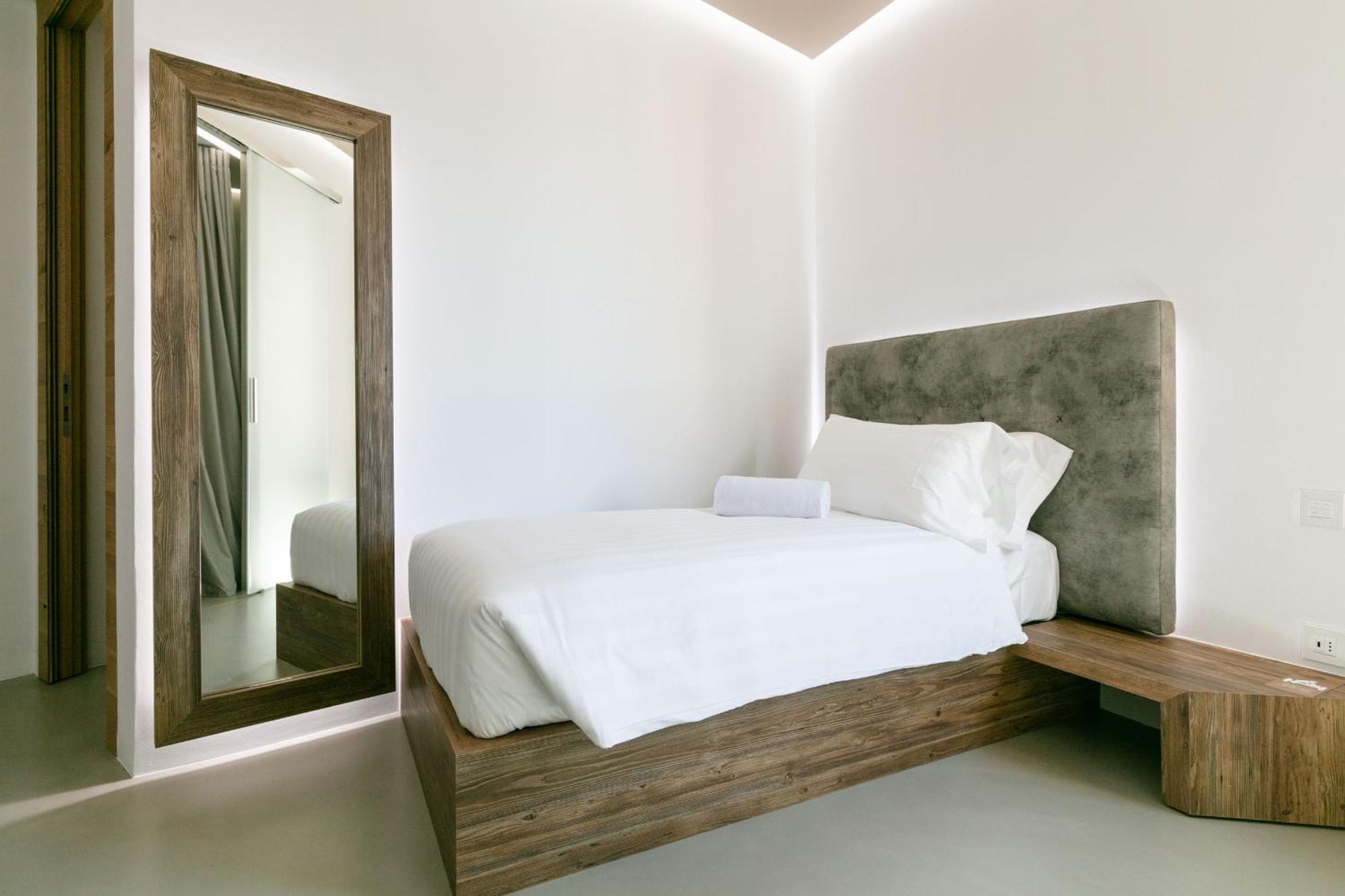 Domus Cavour Rooms&Suites Tirano Pokoj fotografie